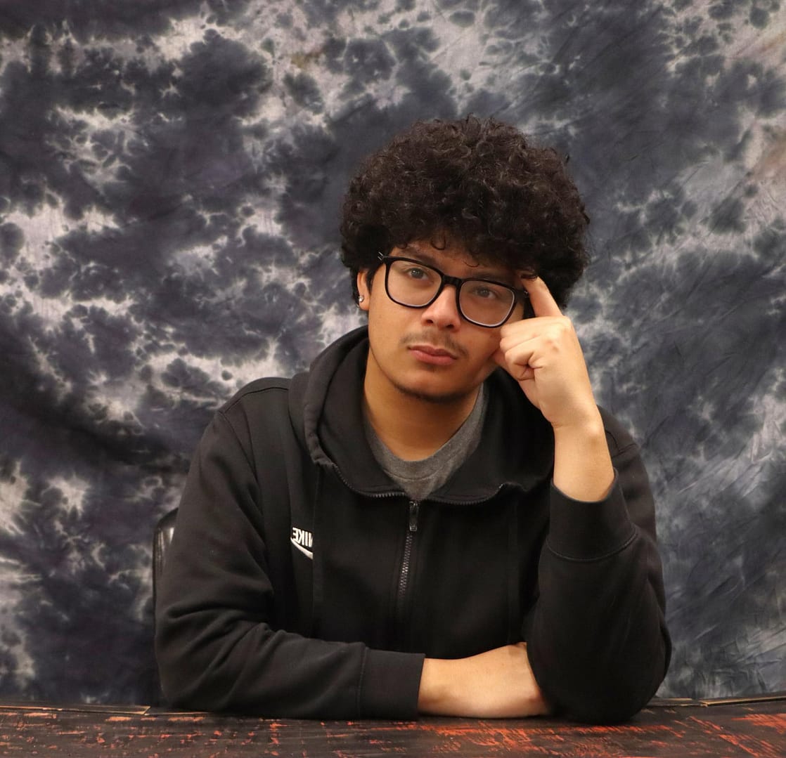 Victor Garcia pondering about his answers in his interview.