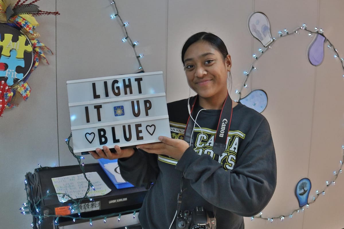 Briana lighting up the hall