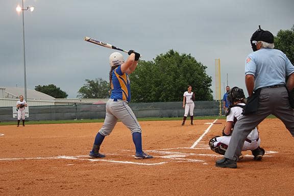 Leeah Seth helps the Corsicana Tigers Varsity down Whitehouse 8-4